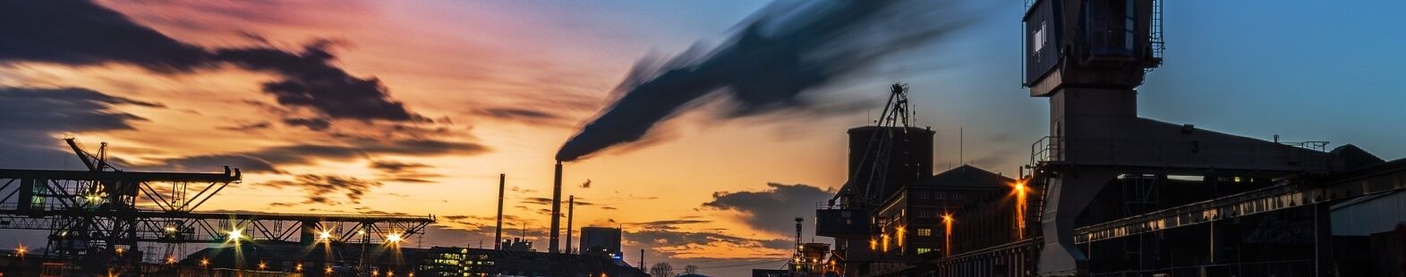 Banner Image for Gilbert's article on the origins of PM2.5 into Quebec shows a sunset skyline with smokestacks