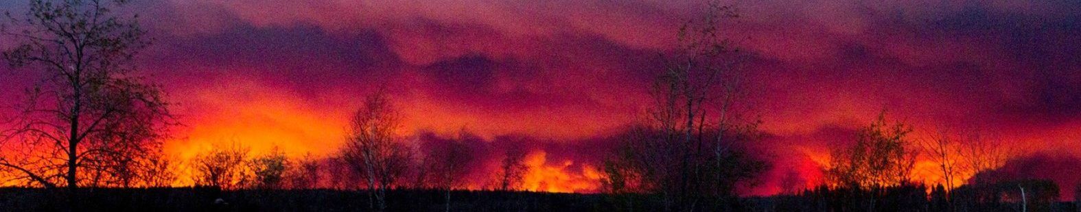 Photo showing Fort McMurray wildfire, filling the horizon with a giant plume of smoke overhead. Did anthropogenic climate change increase the chance of this extreme wildfire?