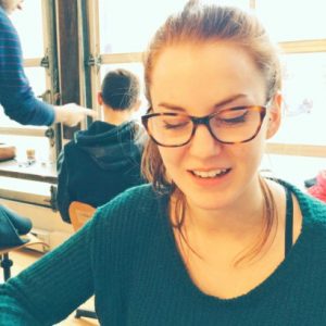 Photo shows a young caucasian woman, wearing glasses. Her hair is pulled back. Samantha Mailhot worked with the Carbon Clock at the Human Impacts Lab.