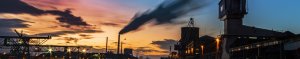 Banner Image for Gilbert's article on the origins of PM2.5 into Quebec shows a sunset skyline with smokestacks