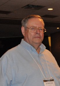 Wayne Evans, CMOS member, photo shows a caucasian man in his 60's, short hair and glasses