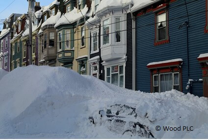 Snowy street with St. John's rowhouses