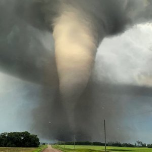 Photo of a large tornado in the prairies of Manitoba
